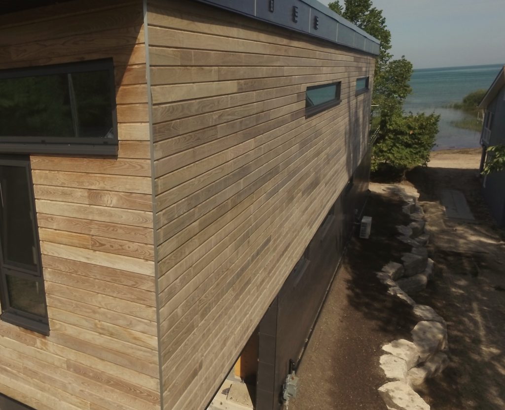 Thermally modified wood siding