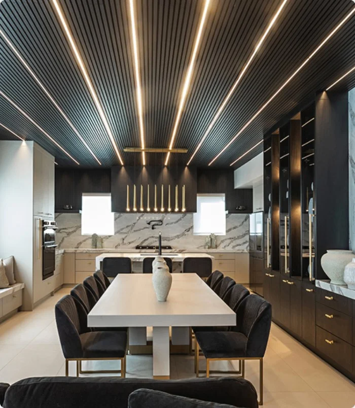 NewTechWood black composite ceiling cladding in a modern kitchen